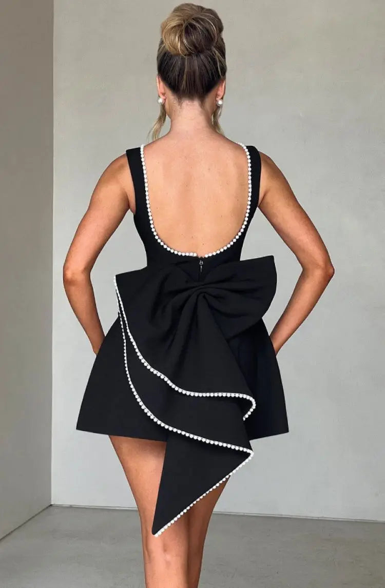 Abito mini nero in fibra sintetica – schiena scoperta, fiocco removibile, abbigliamento da party