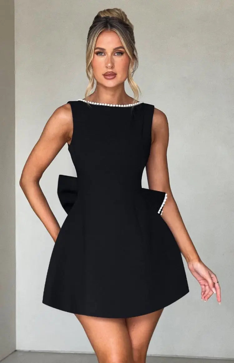 Abito mini nero in fibra sintetica – schiena scoperta, fiocco removibile, abbigliamento da party