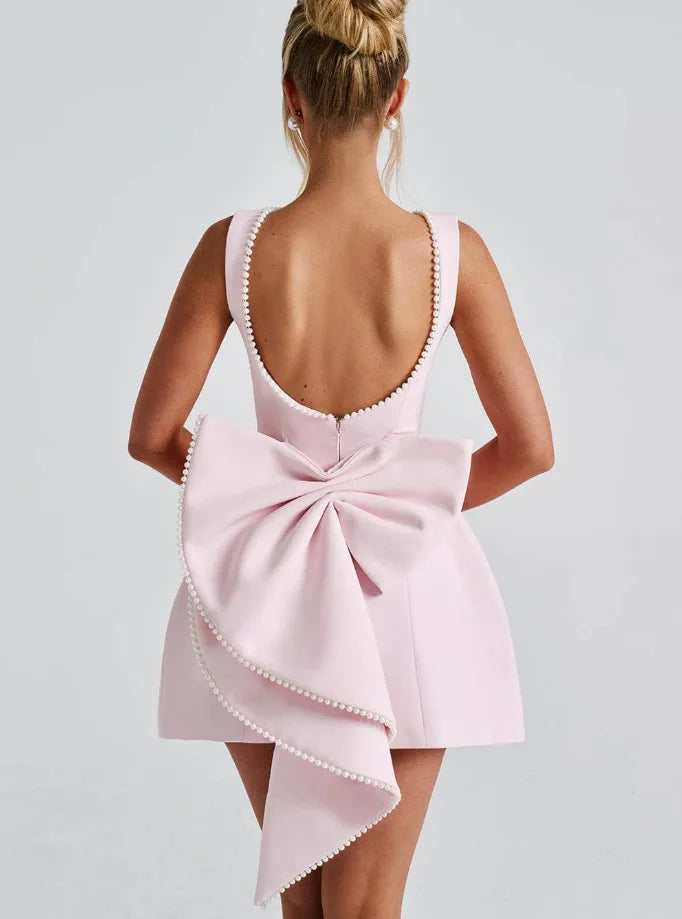 Abito mini rosa in fibra sintetica – schiena scoperta, fiocco removibile, look chic da party