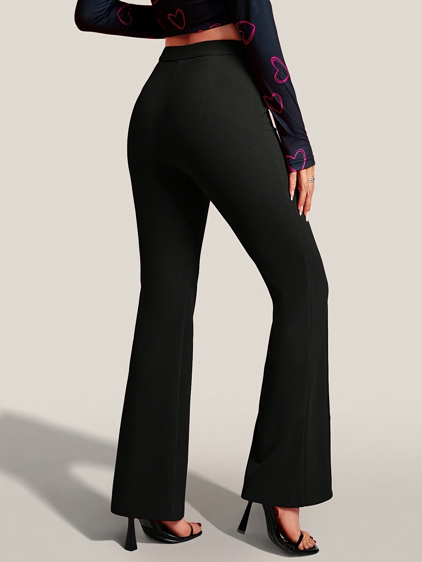 Pantaloni flare in velluto a vita alta - design elegante e sartoriale per ufficio e serate